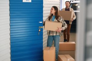 Couple entering storage locker