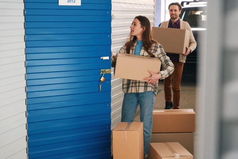 Couple entering storage locker
